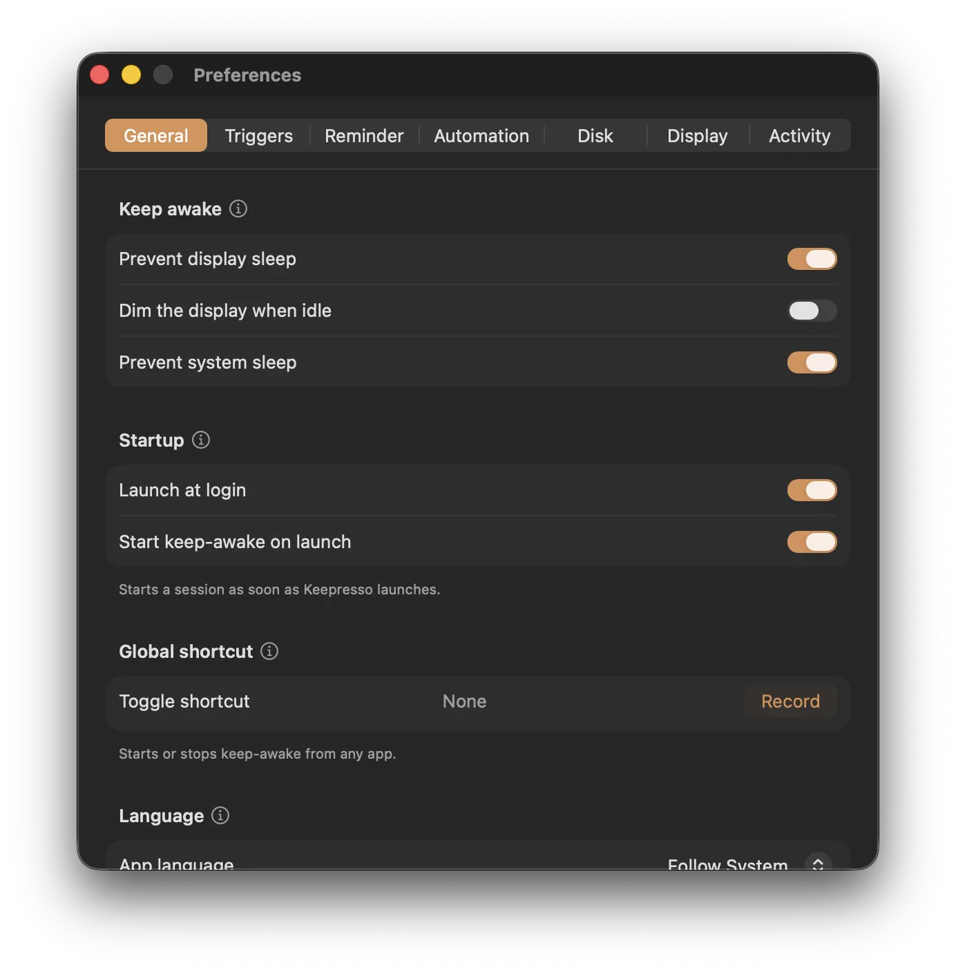 Click to enlarge General preferences: prevent display and system sleep, dim the display when idle, launch at login, a global keep-awake shortcut, and the app language
